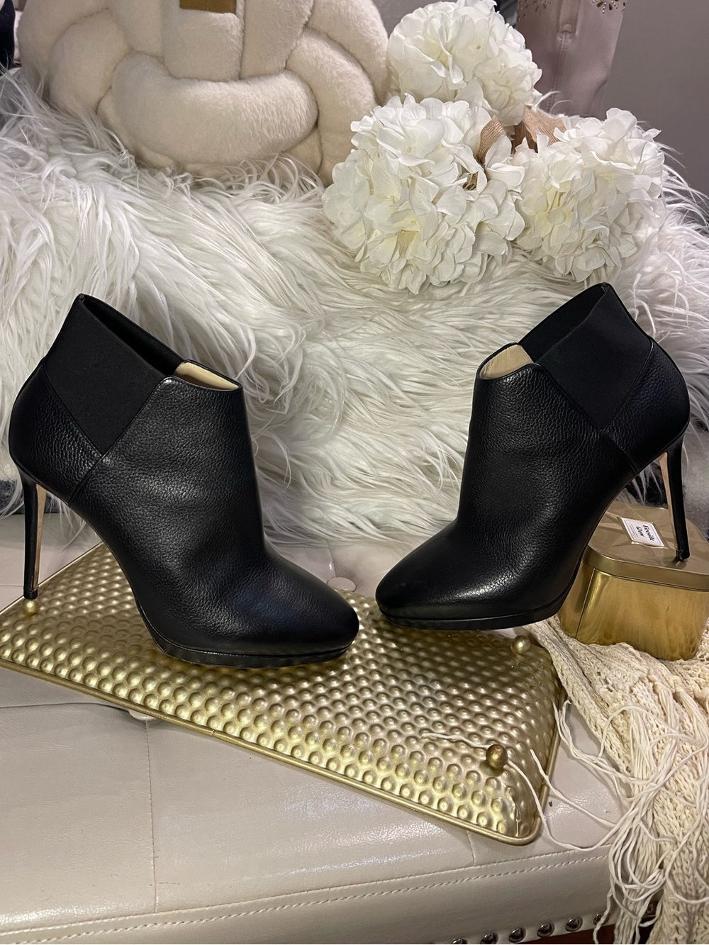 Jimmy Choo “Talula 100” modern, sleek leather stiletto ankle bootie